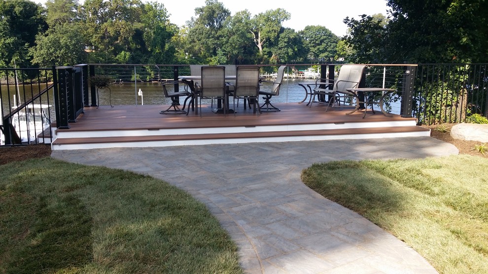 Photo of a mid-sized beach style deck in Baltimore.