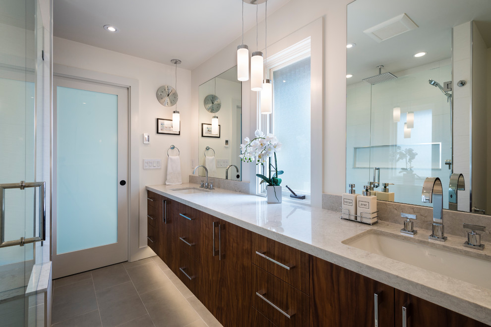 Example of a transitional home design design in Vancouver