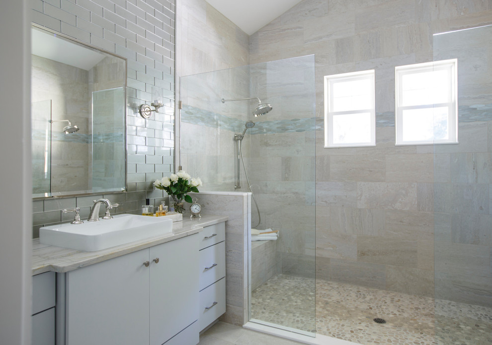 This is an example of a mid-sized contemporary master bathroom in Jacksonville with beige tile, porcelain tile, marble benchtops, flat-panel cabinets, grey cabinets, an open shower, grey walls, porcelain floors and a vessel sink.