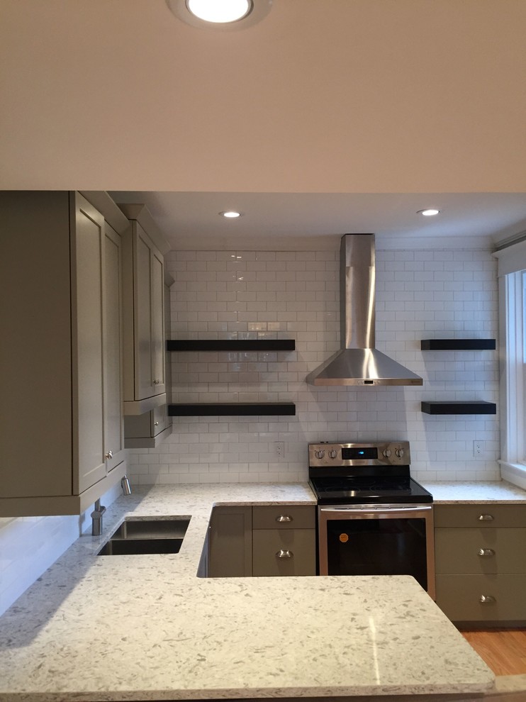 Inspiration for a porcelain tile kitchen remodel with quartz countertops, ceramic backsplash and gray countertops