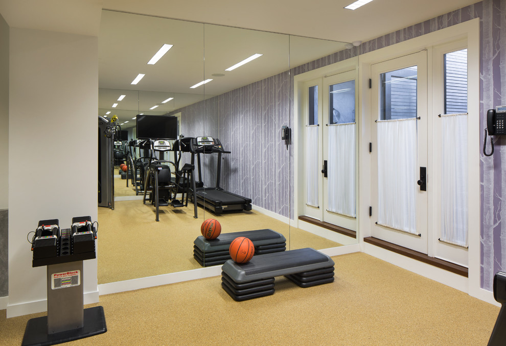 This is an example of a transitional multipurpose gym in New York with purple walls and cork floors.
