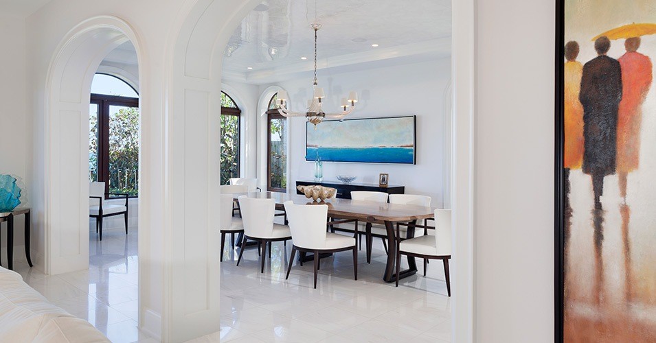 Expansive separate dining room in Miami with grey walls, ceramic floors, white floor and no fireplace.