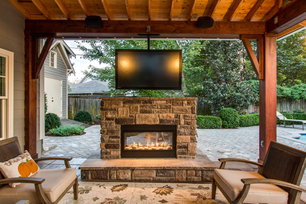 Inspiration for a large country backyard patio in Nashville with a fire feature, decking and a pergola.