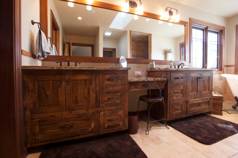 Design ideas for a large country master bathroom in Chicago with shaker cabinets, brown cabinets and a claw-foot tub.