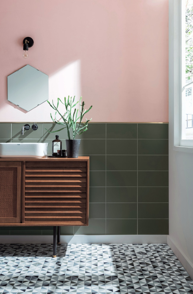 Inspiration for a modern powder room in Other with green tile, ceramic tile, green walls, mosaic tile floors, a drop-in sink and multi-coloured floor.