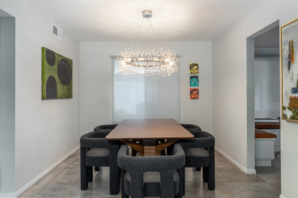 Aménagement d'une salle à manger ouverte sur la cuisine contemporaine avec un mur gris, un sol en carrelage de porcelaine et un sol gris.