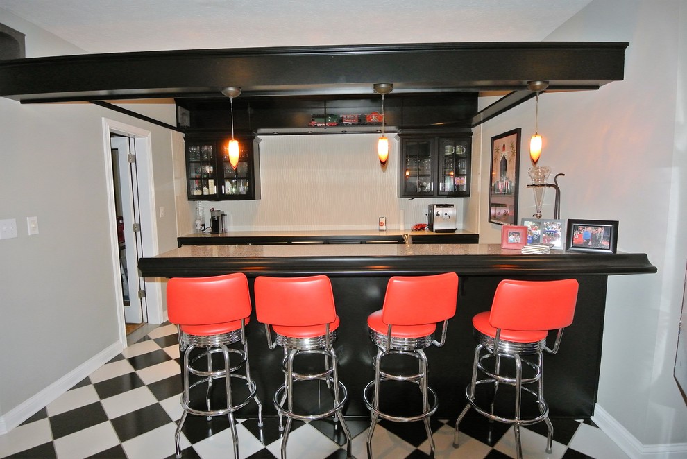 This is an example of a small transitional home bar in Indianapolis.