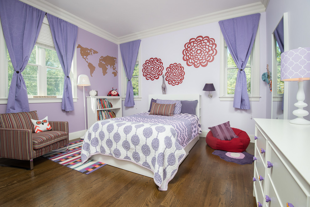 Large traditional bedroom in Boston with purple walls and medium hardwood floors.