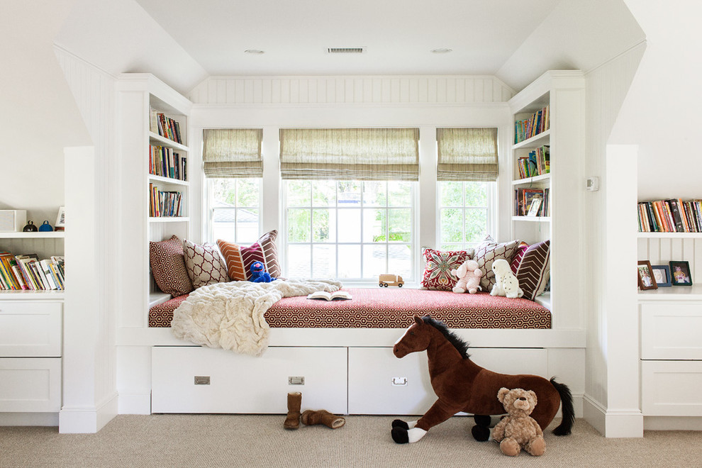 This is an example of a traditional gender-neutral kids' room in New York with white walls and carpet.