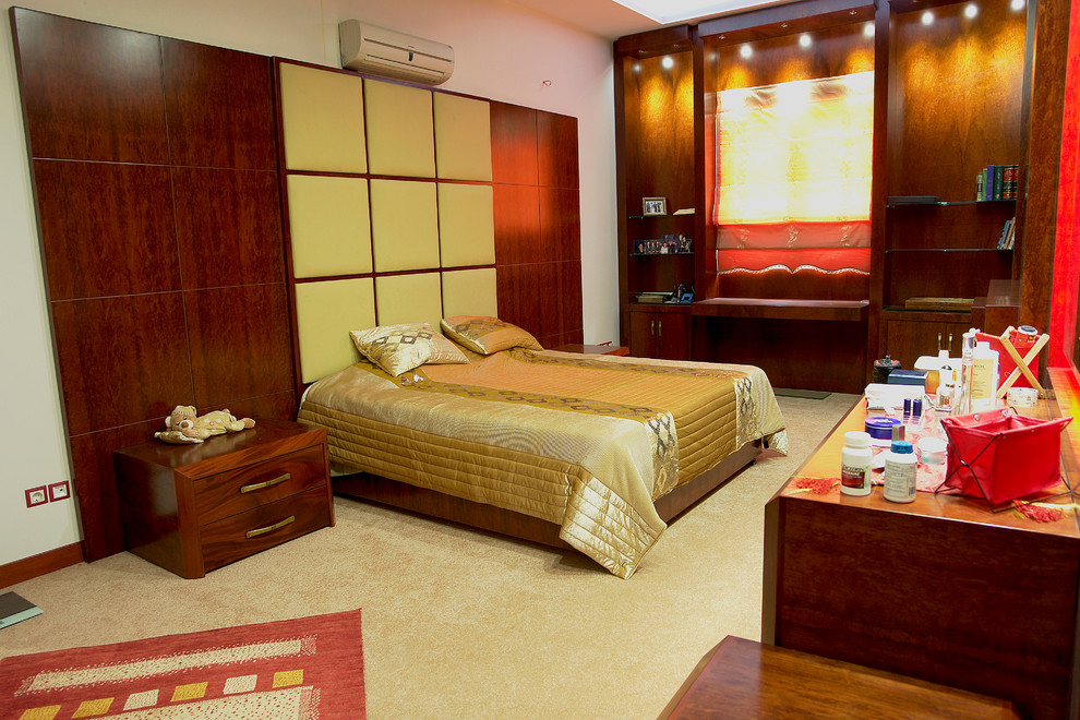 This is an example of an expansive asian loft-style bedroom in Other.