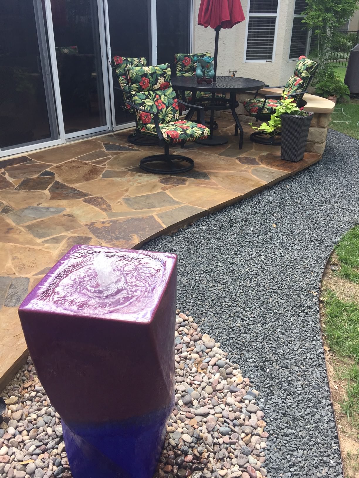 Flagstone patio, basalt and pondless water feature