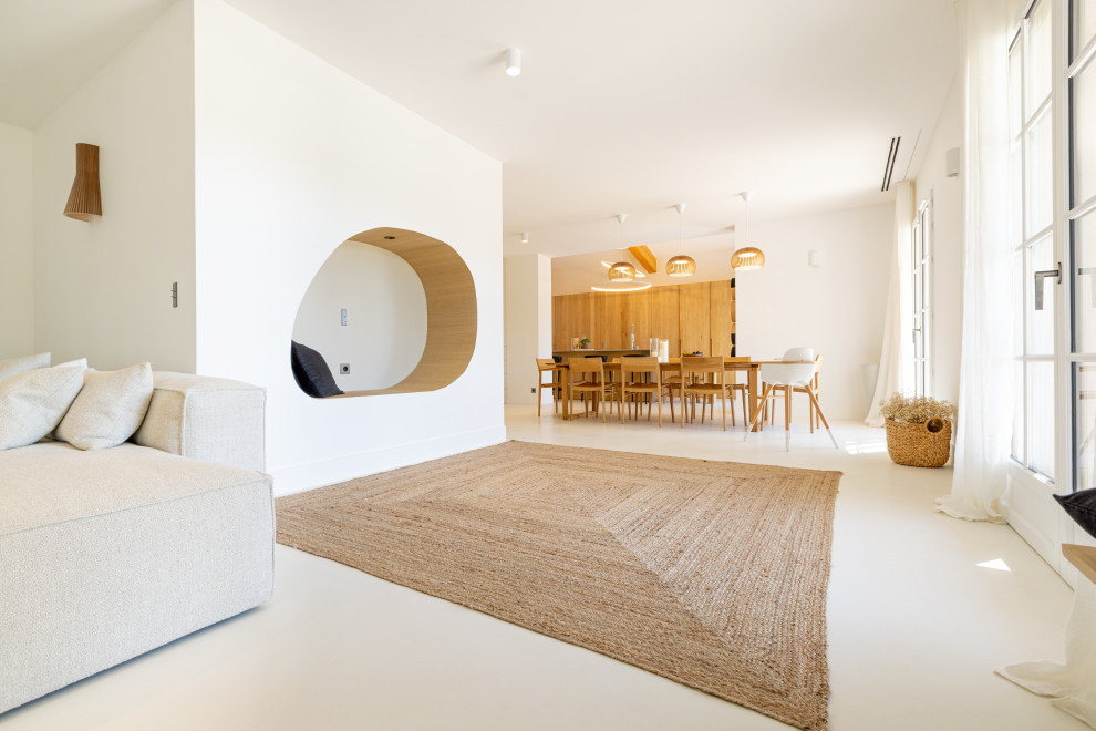 Example of a danish family room design in Nice