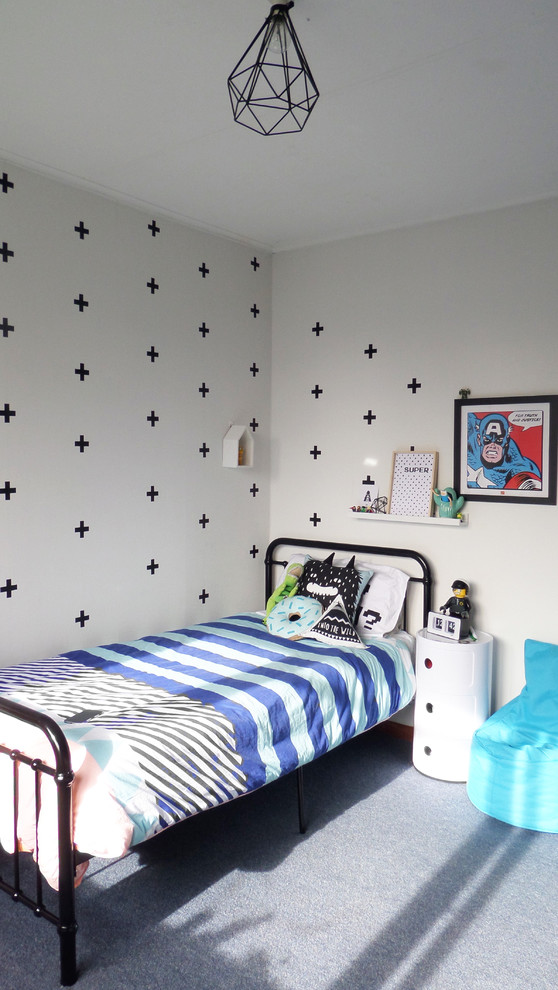 Mid-sized contemporary kids' bedroom in Other with white walls and carpet for kids 4-10 years old and boys.