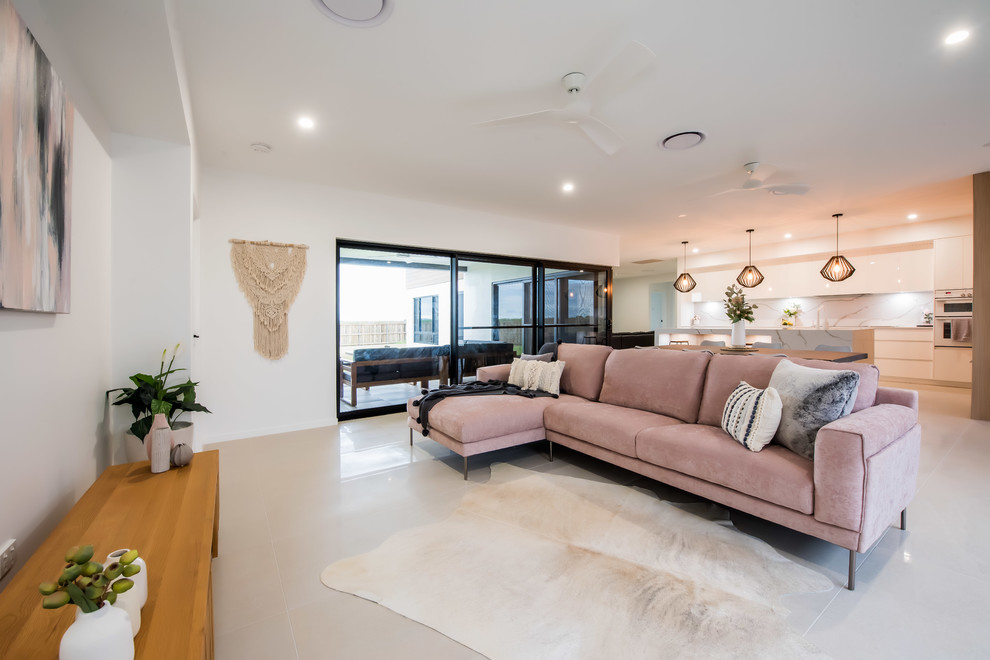 Mid-sized contemporary open concept living room in Other with white walls, ceramic floors and white floor.