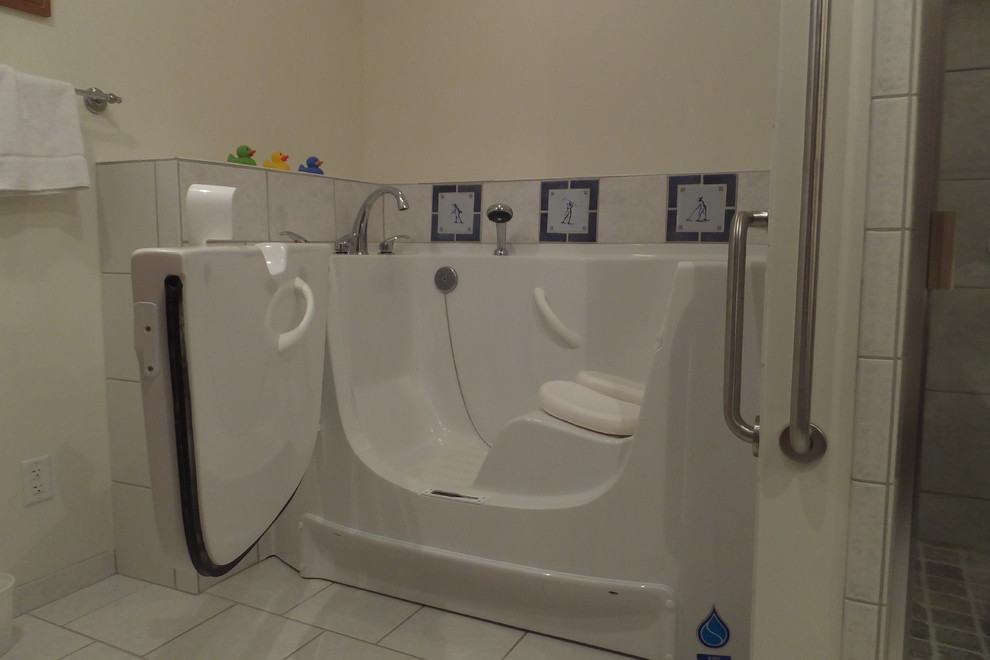 Example of a transitional ceramic tile bathroom design