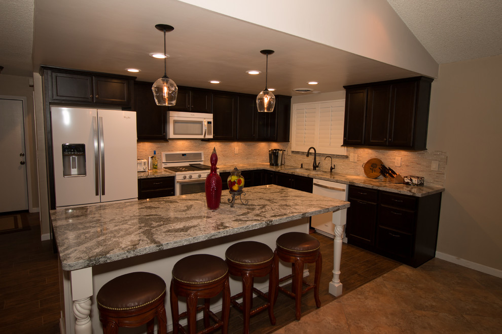 Inspiration for a mid-sized transitional l-shaped porcelain tile open concept kitchen remodel with an undermount sink, flat-panel cabinets, dark wood cabinets, quartz countertops, beige backsplash, glass sheet backsplash, white appliances and an island