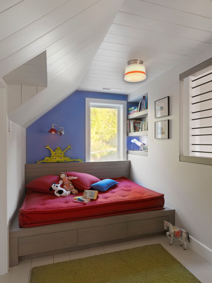 This is an example of a country gender-neutral kids' bedroom in Burlington with multi-coloured walls.