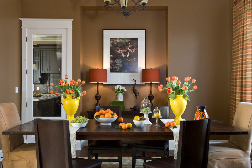 Photo of a contemporary dining room in Vancouver with brown walls.