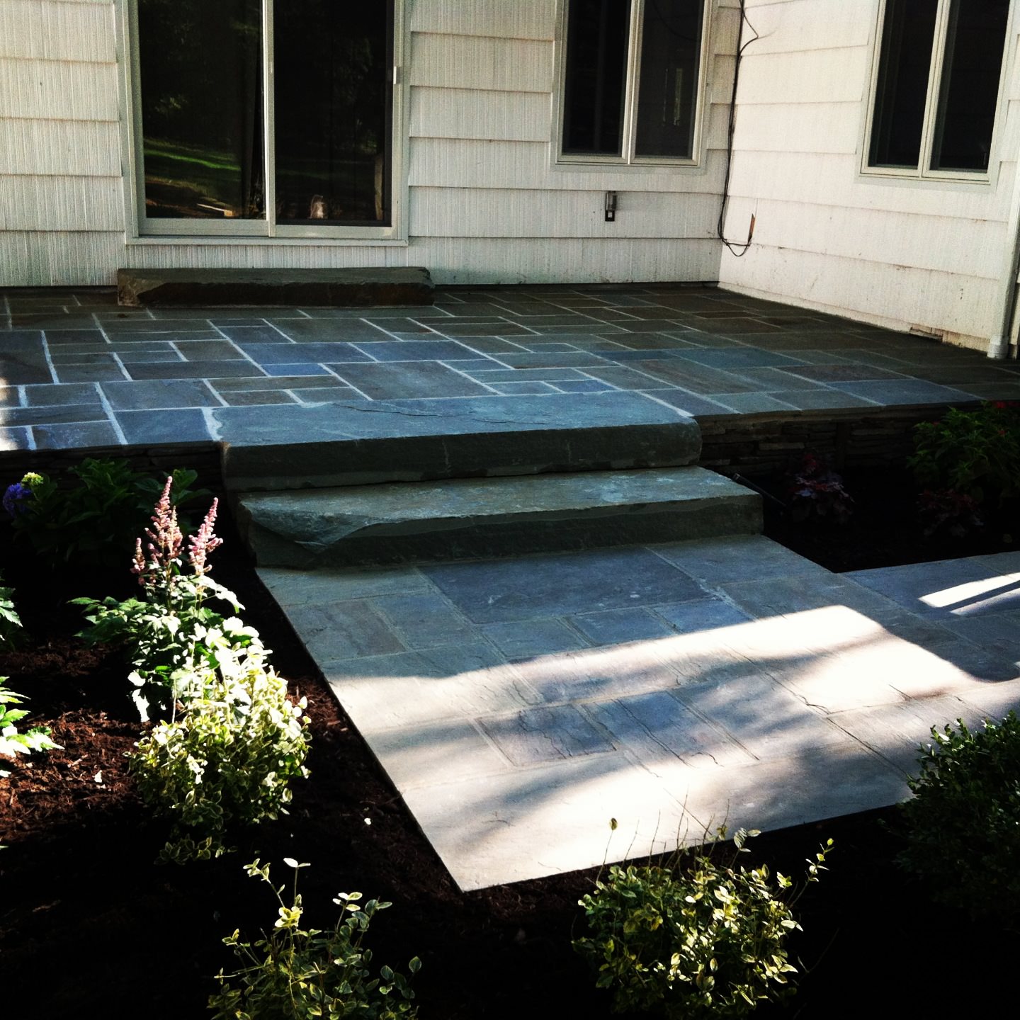 natural bluestone patio's and bluestone walkway and steps