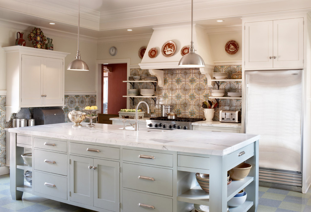 Design ideas for a large mediterranean separate kitchen in Santa Barbara with a farmhouse sink, shaker cabinets, white cabinets, multi-coloured splashback, stainless steel appliances, with island, multi-coloured floor, marble benchtops and cement tile splashback.