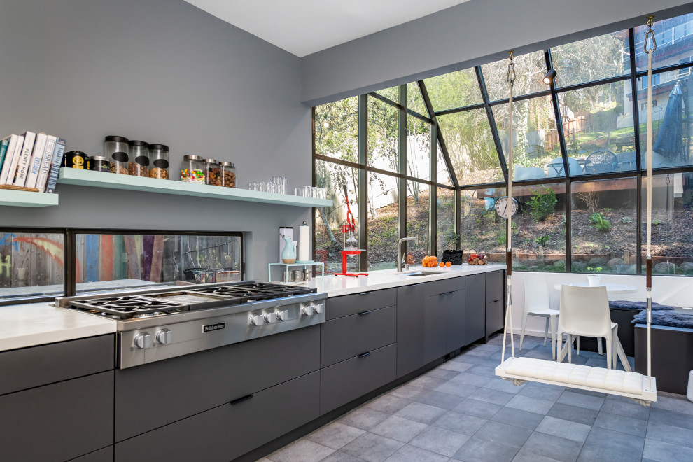 Kitchen pantry - mid-sized modern l-shaped ceramic tile and gray floor kitchen pantry idea in San Francisco with a single-bowl sink, flat-panel cabinets, gray cabinets, quartz countertops, white backsplash, quartz backsplash, stainless steel appliances and white countertops