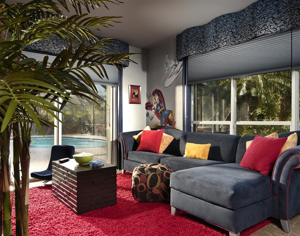 Design ideas for a modern family room in Miami.