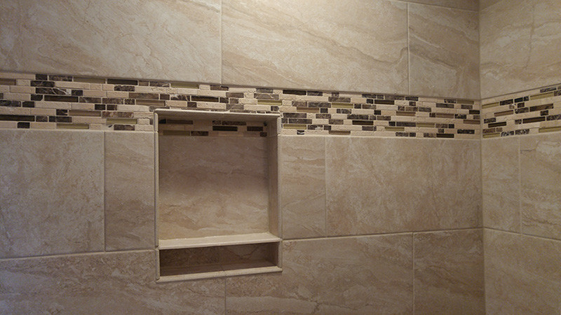 Inspiration for a mid-sized transitional 3/4 beige tile and ceramic tile ceramic tile alcove bathtub remodel with shaker cabinets, dark wood cabinets, a two-piece toilet, white walls, an integrated sink and quartz countertops