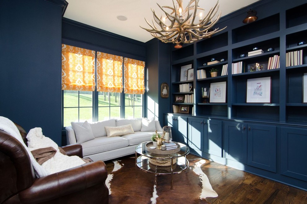 Inspiration for a mid-sized transitional study room in Atlanta with blue walls, dark hardwood floors, no fireplace and brown floor.