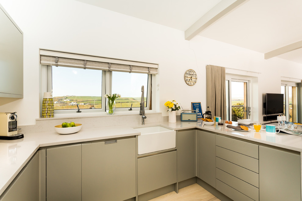 This is an example of a contemporary kitchen in Cornwall.