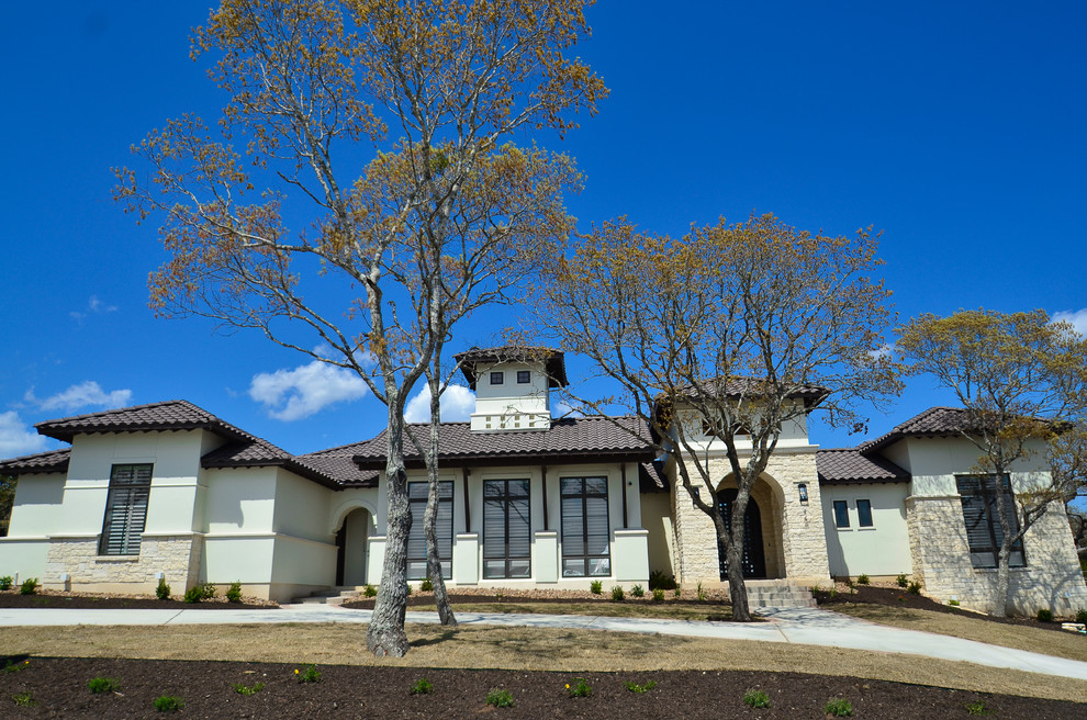 Transitional exterior home photo in Austin