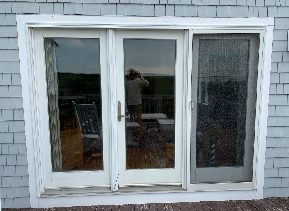 Hurricane rated patio door with two side panels