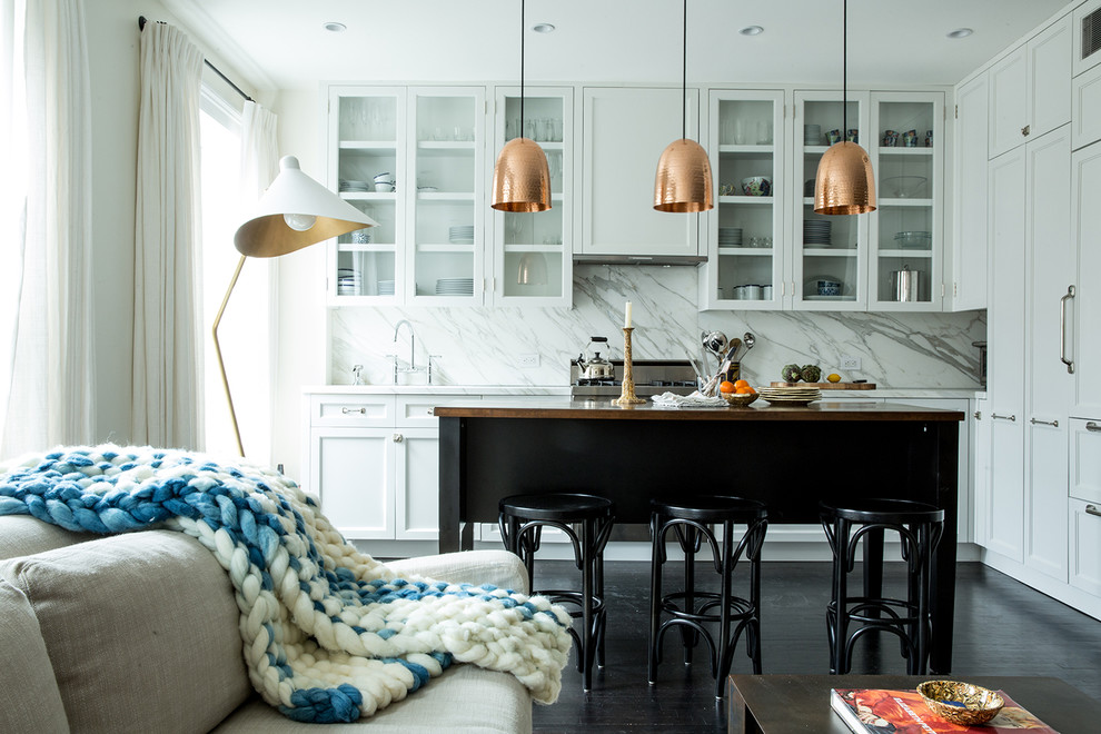 Open concept kitchen - mid-sized transitional l-shaped dark wood floor open concept kitchen idea in New York with shaker cabinets, white cabinets, stainless steel appliances, an island, an undermount sink, wood countertops, white backsplash and marble backsplash