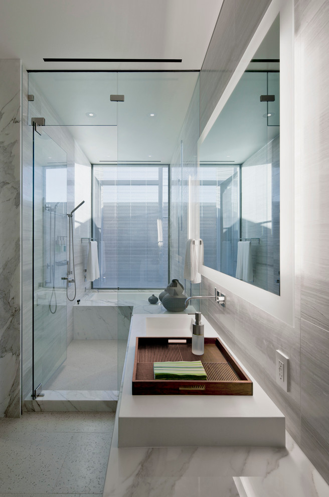 Photo of a contemporary bathroom in Las Vegas with a vessel sink, an alcove shower and white tile.