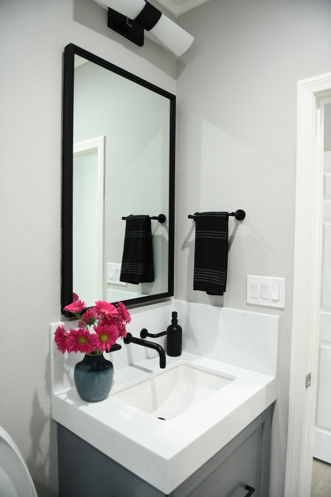 Inspiration for a mid-sized transitional 3/4 white tile and marble tile porcelain tile, beige floor and single-sink walk-in shower remodel in San Diego with shaker cabinets, gray cabinets, a bidet, gray walls, an undermount sink, quartz countertops, a hinged shower door, white countertops, a niche and a floating vanity