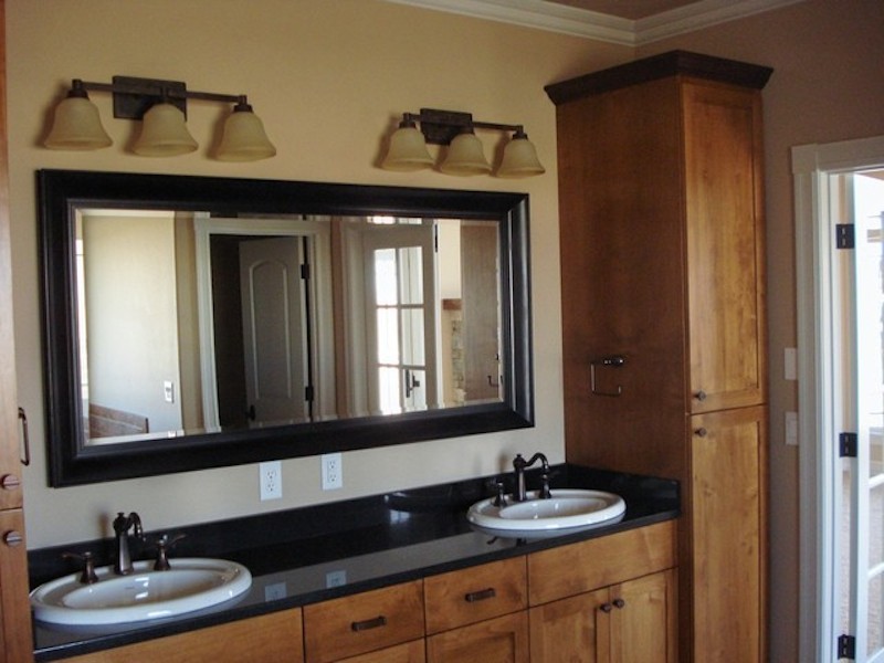 This is an example of a mid-sized arts and crafts master bathroom in Other with shaker cabinets, medium wood cabinets, an alcove tub, an alcove shower, beige tile, stone tile, beige walls, a drop-in sink, engineered quartz benchtops and an open shower.