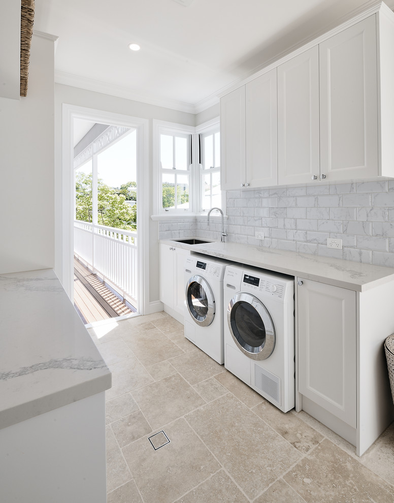 Photo of a contemporary laundry room in Brisbane.