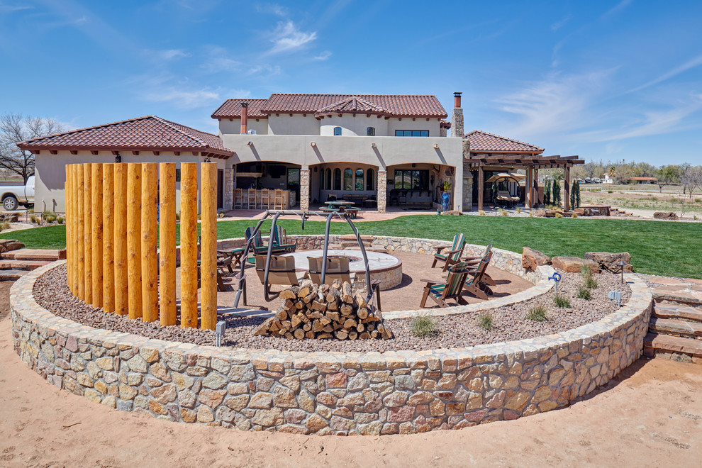 Example of a large mountain style home design design