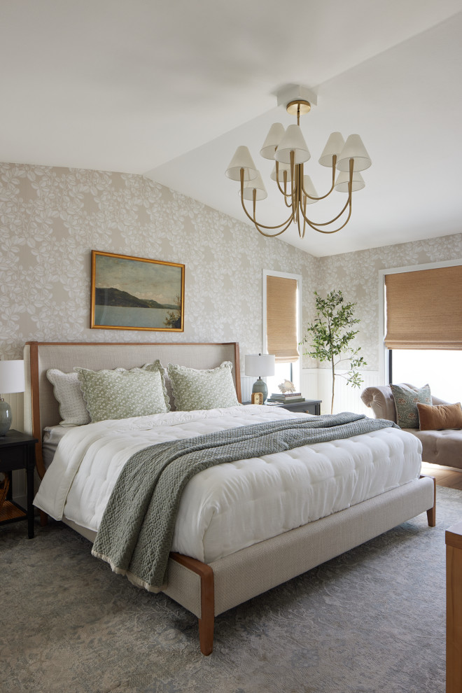 Example of a transitional bedroom design in Orange County