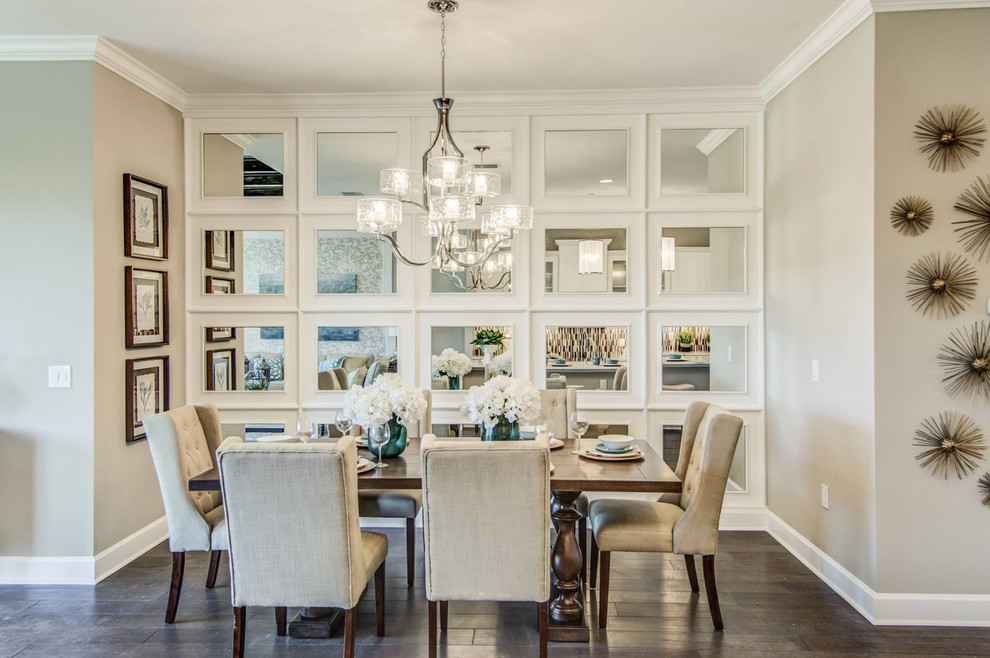 Photo of a dining room in Tampa with white walls, medium hardwood floors, brown floor and planked wall panelling.