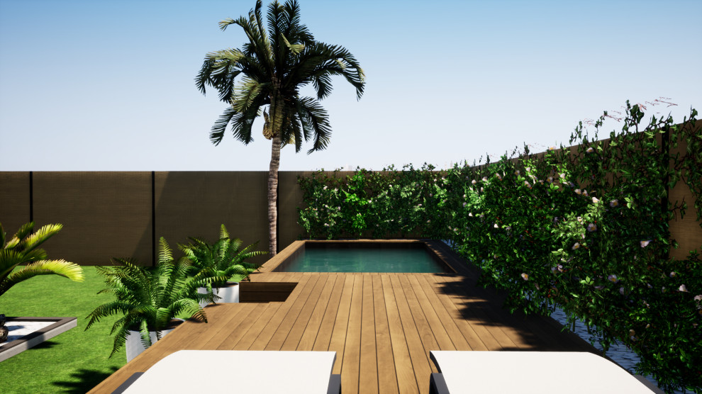 Esempio di una piccola piscina fuori terra moderna rettangolare dietro casa con paesaggistica bordo piscina e pedane