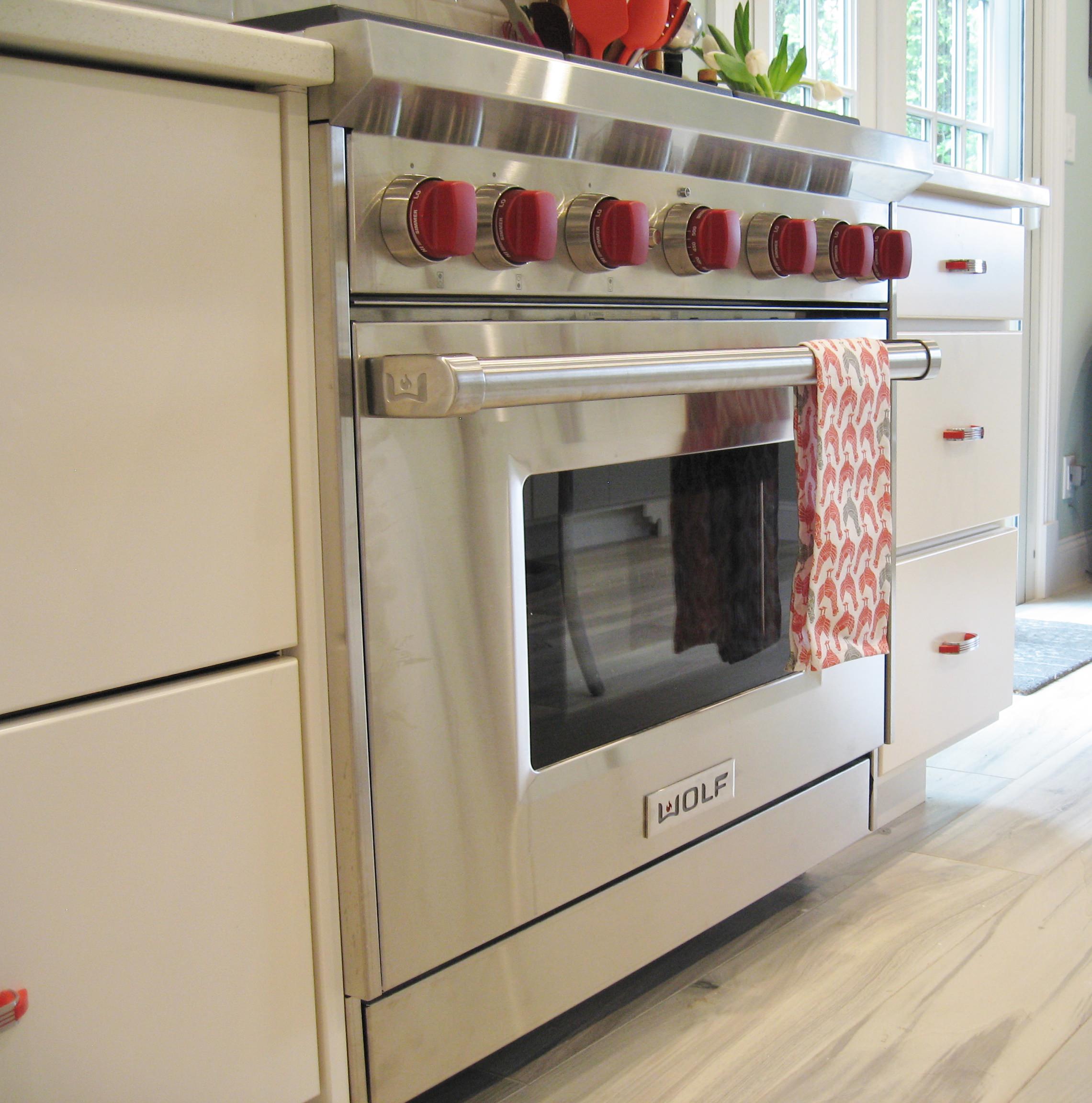 Off-White and Retro Red Accented Kitchen