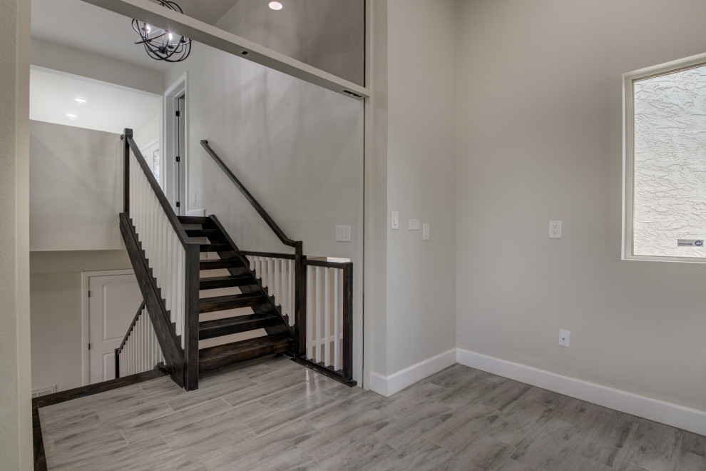 Inspiration for a mid-sized transitional porcelain tile and gray floor hallway remodel in Phoenix