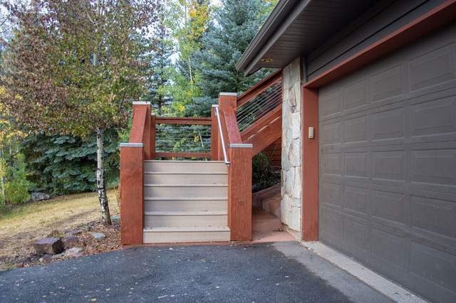 Timber Stairs w/Stainless Steel Post Covers & Cable Railing contemporary-deck