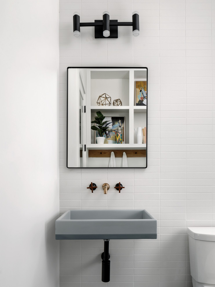 Example of a mid-sized 1960s white tile powder room design in San Francisco with white walls, a wall-mount sink and a freestanding vanity