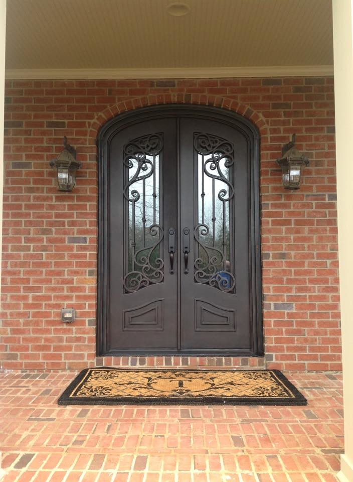 Inspiration for a large transitional front door remodel in Atlanta with a black front door