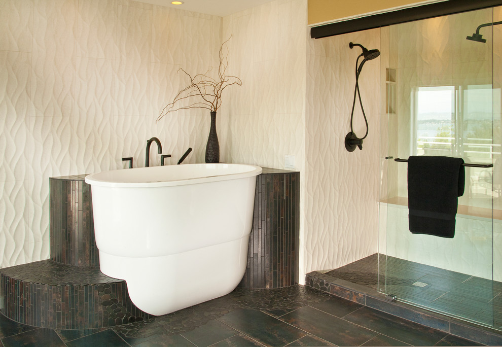 Photo of a large asian master bathroom in Seattle with a vessel sink, flat-panel cabinets, medium wood cabinets, engineered quartz benchtops, a japanese tub, a double shower, a two-piece toilet, white tile, porcelain tile, beige walls and porcelain floors.