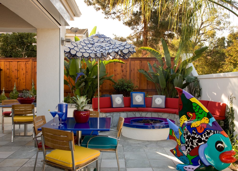 This is an example of a contemporary patio in San Diego with a fire feature.