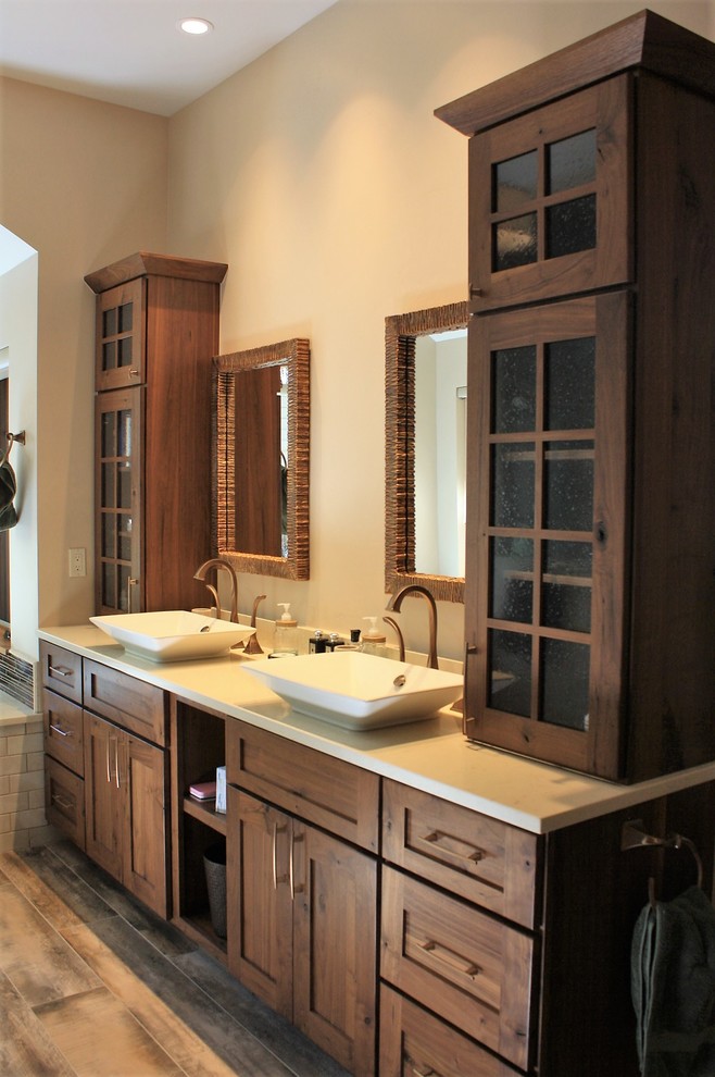 Inspiration for a large rustic master brown floor bathroom remodel with quartz countertops