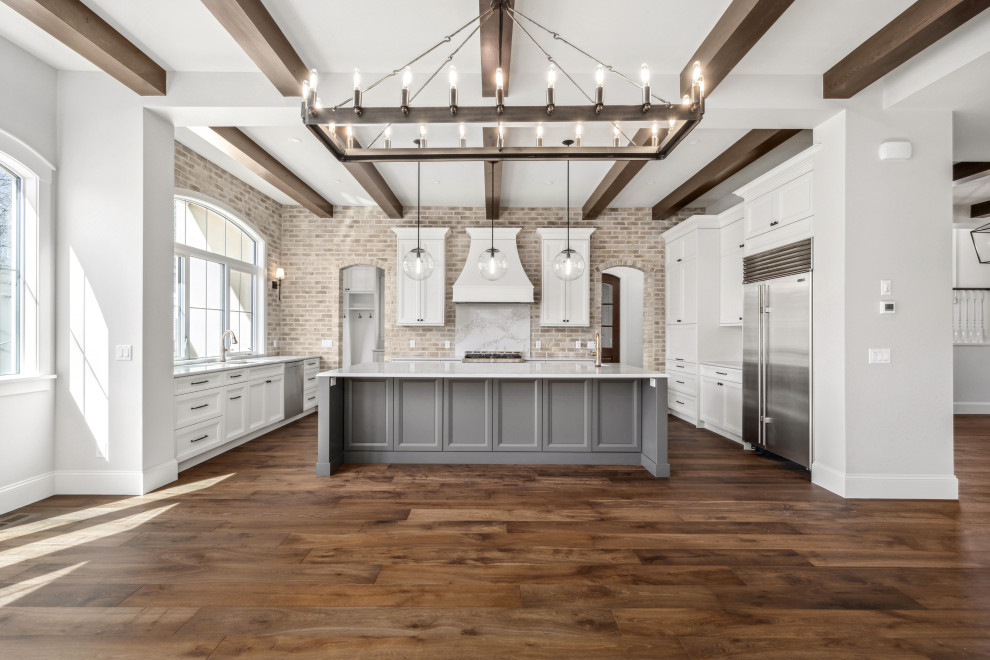 Example of a transitional kitchen design in Calgary