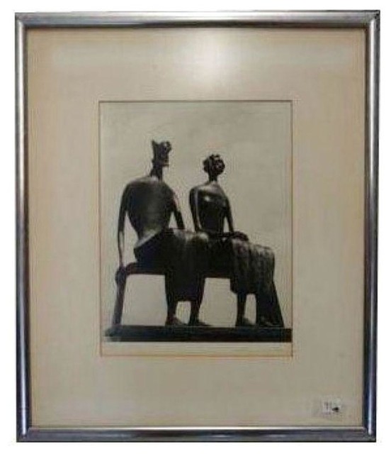 Framed Print of Man and Woman Sitting Statue